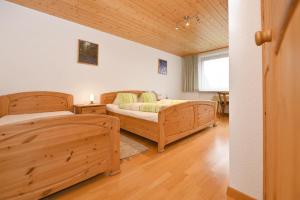 Letto o letti in una camera di Haus Valuga