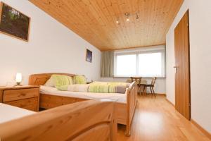 Letto o letti in una camera di Haus Valuga