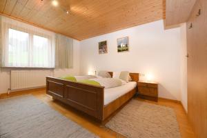 Letto o letti in una camera di Haus Valuga