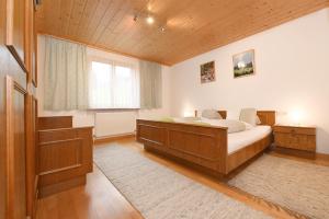Letto o letti in una camera di Haus Valuga