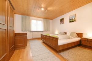 Letto o letti in una camera di Haus Valuga