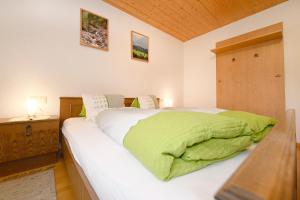 Letto o letti in una camera di Haus Valuga