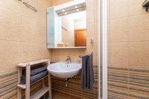 Koupelna v ubytování Happy Apartments Baška + 37 fotografií