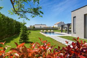 Vonkajšia záhrada v ubytovaní Villa Topaz