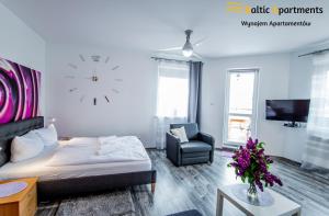 Telewizja i/lub zestaw kina domowego w obiekcie Baltic Apartments - Apartament Słoneczny Taras