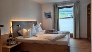 Posteľ alebo postele v izbe v ubytovaní Appartements Haus Olympia + 37 fotografií