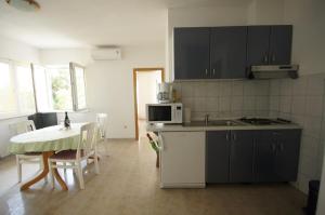 Kuchyňa alebo kuchynka v ubytovaní Apartment 75-5
