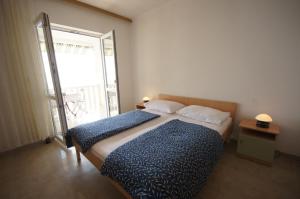 Posteľ alebo postele v izbe v ubytovaní Apartment 75-5