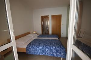 Posteľ alebo postele v izbe v ubytovaní Apartment 75-5