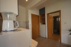 Kuchyňa alebo kuchynka v ubytovaní Apartment 75-5