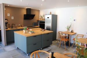 Kuchyň nebo kuchyňský kout v ubytování Hotel Petite B&B