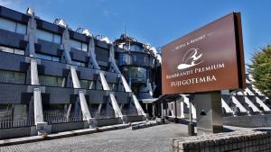 a sign in front of a building at Rembrandt Premium Fuji Gotenba in Gotemba