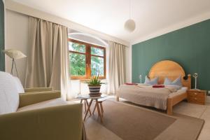 Posteľ alebo postele v izbe v ubytovaní Absteige Innsbruck- Zentrale Ferienapartments