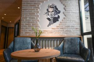 Uma área de estar em Hotel Beethoven