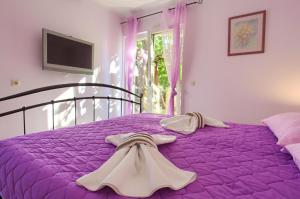 Posteľ alebo postele v izbe v ubytovaní Romantic apartment
