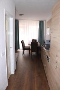 Fotografia z galérie ubytovania Liget Apartmanház v destinácii Kehidakustány