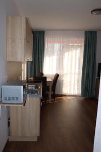 Fotografia z galérie ubytovania Liget Apartmanház v destinácii Kehidakustány