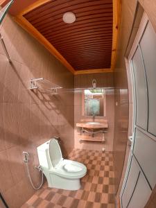 Koupelna v ubytování New Breeze Thoddoo Inn