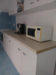 Kuchyň nebo kuchyňský kout v ubytování CASA CATERINA JURILOVCA