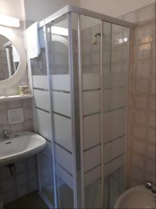 Koupelna v ubytování Albergo Italia