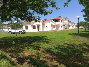 a car parked in front of a house at Elli S onar in Sykia Chalkidikis