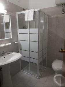 Koupelna v ubytování Albergo Italia