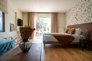 Hôtel Le Mouton Bleu客房内的一张或多张床位
