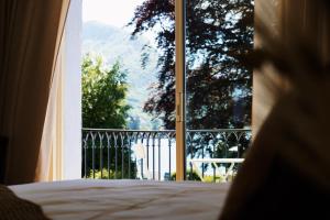 Hôtel Le Mouton Bleu客房内的一张或多张床位