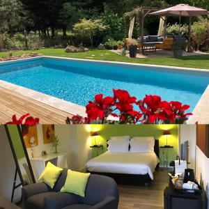 Habitación de hotel con cama y piscina en Les Chambres Lauryvan, en Saint-Junien