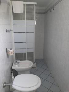 Koupelna v ubytování Albergo Italia