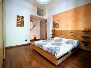 Ένα ή περισσότερα κρεβάτια σε δωμάτιο στο DIMORA MARTINETTI (FIUMARA/SCASSI) - GENOVABNB it