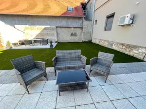 Posedenie v ubytovaní Holiday Apartmanház