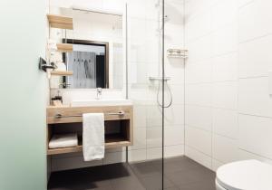 Koupelna v ubytování Hotel Smart Liv'in