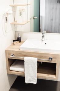 Koupelna v ubytování Hotel Smart Liv'in