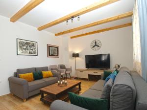 Televízia a/alebo spoločenská miestnosť v ubytovaní Villa Stella 2086