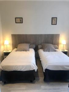 Postel nebo postele na pokoji v ubytování L'instant Présent