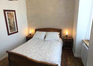 Postel nebo postele na pokoji v ubytování L'instant Présent