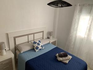 Posteľ alebo postele v izbe v ubytovaní Sunny Beach Retreat