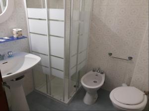 Koupelna v ubytování Albergo Italia