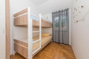 Posteľ alebo postele v izbe v ubytovaní Deluxe 3 bedroom apartment with sea view