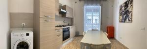 Kuchyňa alebo kuchynka v ubytovaní Catania Apartment Borgo Suite Autonomous