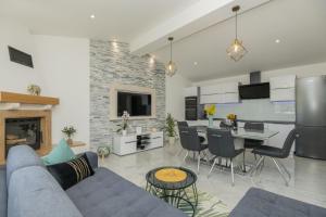 TV a/nebo společenská místnost v ubytování Holiday Home Maslina
