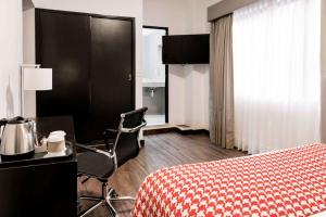 Voodi või voodid majutusasutuse Wyndham Costa del Sol Piura toas