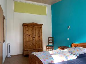 Postel nebo postele na pokoji v ubytování Ferienwohnung Parkblick + 2 fotografie