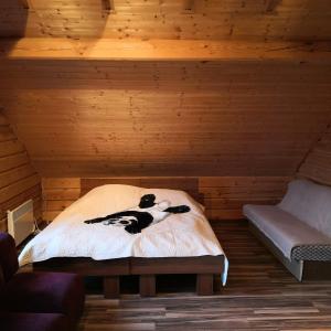 Posteľ alebo postele v izbe v ubytovaní Lake House Villa pas Eugenija