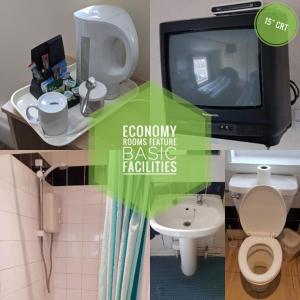 a bathroom with a tv and a toilet and a sink at The Carlton Hotel in Ipswich