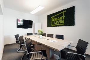 TV a/nebo společenská místnost v ubytování Hotel Smart Liv'in