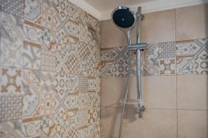 Koupelna v ubytování IL GIARDINO DEL MANDARINO HOUSE + 34 fotografií