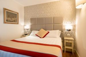 Posteľ alebo postele v izbe v ubytovaní Dei Priori Boutique Hotel