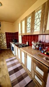 A kitchen or kitchenette at Veronika Guesthouse